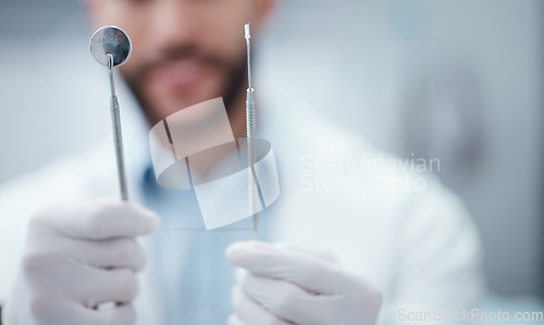 Image of Hands, dentist mouth mirror and excavator for healthcare wellness checkup, teeth surgery or annual dental maintenance. Zoom, man and orthodontist with metal tools for teeth cleaning or hygiene help