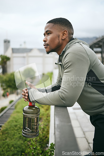 Image of Fitness, thinking or black man at a park to relax in nature after training, exercise or outdoor workout. Wellness, mindset or healthy African sports athlete with body goals, vision or motivation