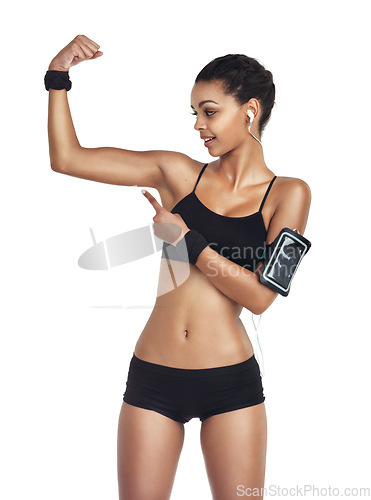 Image of Studio, strong arm and black woman pointing at bodybuilder training, wellness workout and health exercise results. Listening to music, radio podcast and fitness model isolated on white background