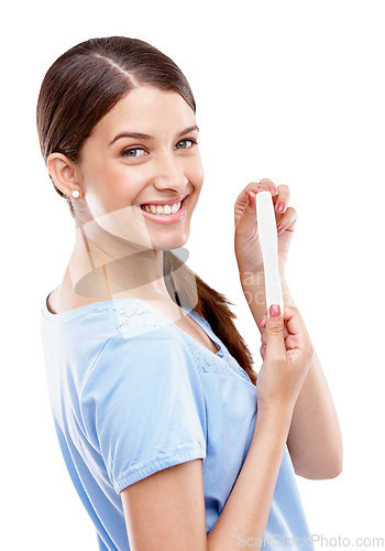 Image of Pregnancy test, happy and portrait of a woman in a studio with good, exciting and positive news. Happiness, smile and young female model with a prenatal urine kit isolated by a white background.