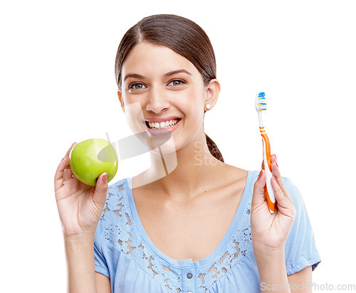 Image of Dental, health and apple with woman and toothbrush for nutrition, medical and cleaning. Fruit, diet and wellness with isolated face of girl for oral hygiene, teeth and food on white background