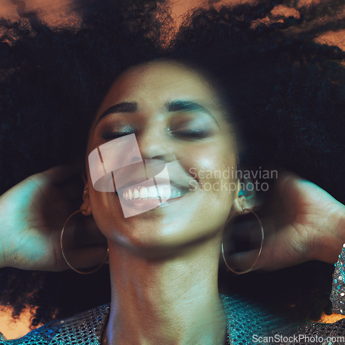 Image of Hair, beauty and face blur of black woman with afro in studio for hair care, beauty products and wellness. Creative art, hair salon and happy female with motion for cosmetics, fashion and makeup