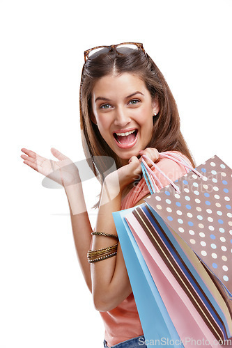 Image of Woman is shopping, paper bag and retail portrait, fashion with happy customer isolated on white background. Discount, sale and excited customer with shopping bag, luxury designer brand and clothes