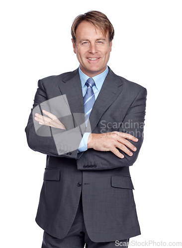 Image of Businessman, studio portrait and suit with arms crossed, smile or leadership success by white background. Happy corporate leader, focus and isolated for executive goal, mission or professional vision