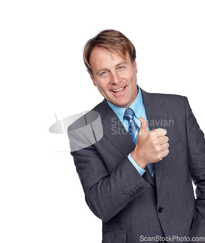 Image of Studio portrait, businessman and thumbs up with suit, focus or smile in leadership by white background. Happy corporate leader, motivation and isolated for success, mission and professional vision