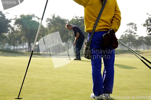 Image of caddie at work