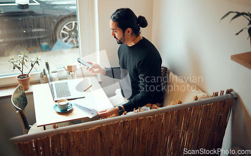 Image of Phone, laptop and businessman working in coffee shop planning startup strategy, business communication or social networking. Cafe, small business designer and freelance employee on 5g digital tech