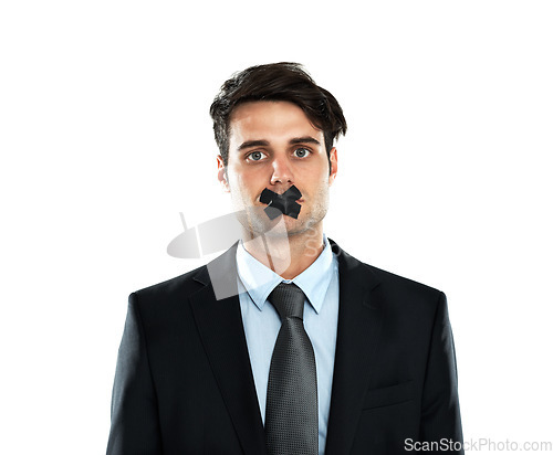 Image of Secret, silence and portrait of a businessman with tape on lips isolated on a white background. Quiet, hostage and silenced employee with covered mouth as an office worker on a studio background