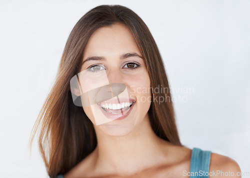 Image of Happy, portrait and woman in studio for makeup, grooming and self care on white background. Face, girl and skin model relax after luxury, treatment and hygiene routine and cosmetics while isolated