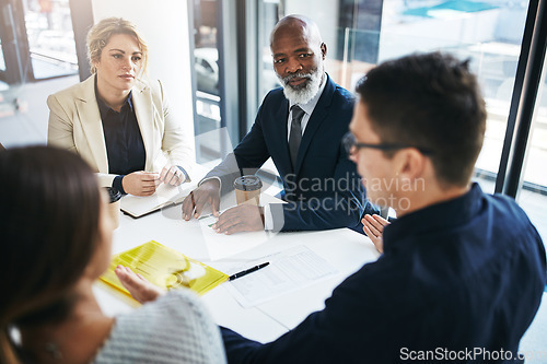 Image of Business people, meeting and team discussion for strategy, marketing or collaboration at the office. Group of employee workers in business meeting, teamwork or coaching for sales at the workplace