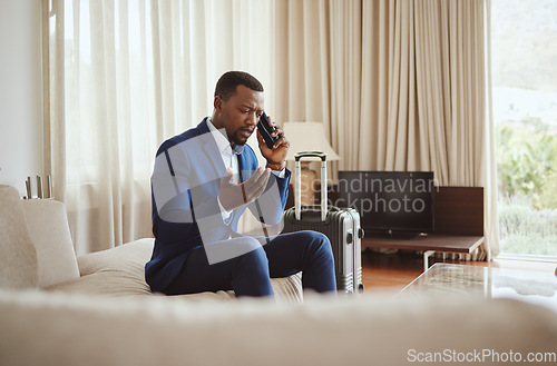 Image of Phone call, travel stress and businessman with a phone for hotel communication, transport problem and work fail. Angry, conversation and black man with a mobile talking about accommodation mistake