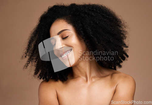 Image of Hair care, afro beauty and face of black woman with clean shampoo hair, healthy hair growth and happy with spa salon treatment. Wellness, trichology and model with skincare glow, makeup and cosmetics