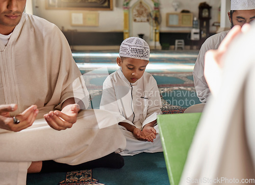 Image of Muslim, child or men prayer to worship Allah in holy temple or mosque with gratitude as a family on Ramadan. Islamic, community or people in praying with boy or kid for Gods support, spiritual peace