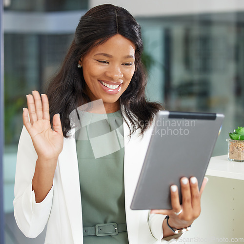 Image of Tablet, wave and video call with a business black woman at work in her office for an online meeting. Communication, networking and internet with a female employee waving during a wireless chat