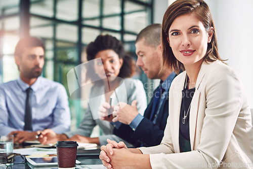 Image of Business people, woman and leader portrait while in a office meeting with her team for growth. Face of corporate female entrepreneur for diversity and vision for innovation in a happy workplace