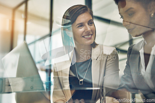 Image of Business women, laptop and discussion planning tech strategy, marketing meeting or happy teamwork collaboration. Business people, web design and ux designers development on digital device in office