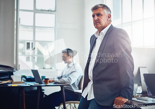 Image of Success, vision and manager thinking of a plan, ideas and strategy for work at a corporate company. CEO, executive and mature businessman with an idea for a professional agency in the workplace