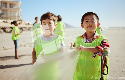 Image of Children, portrait or trash collection bag in beach waste management, ocean cleanup or sea community service. Happy kids, climate change or cleaning volunteering plastic for nature recycling bonding