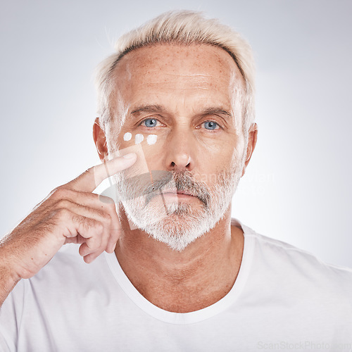 Image of Skincare, cream and portrait of senior man on white background for beauty, wellness and dermatology. Cosmetics, grooming and elderly male with anti aging beauty products, facial treatment and lotion