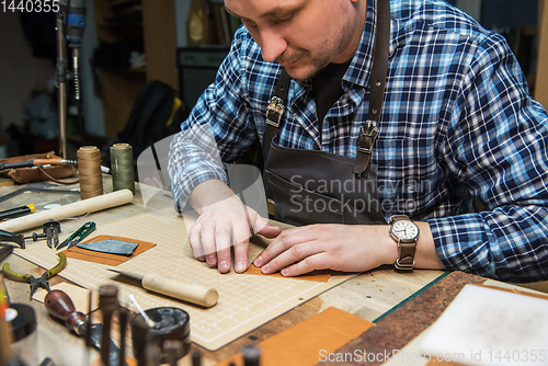 Image of Concept of handmade craft production of leather goods.