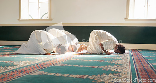 Image of Muslim, prayer and mosque with a spiritual man group praying together during fajr, dhuhr or asr, otherwise maghrib or ishaa. Salah, worship and pray with islamic friends observing ramadan tradition