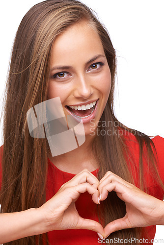 Image of Woman, smile portrait and heart hands shape, emoji for love sign, happiness and support in white background. Model face, happy symbol and self care peace or excited hand gesture in isolated studio