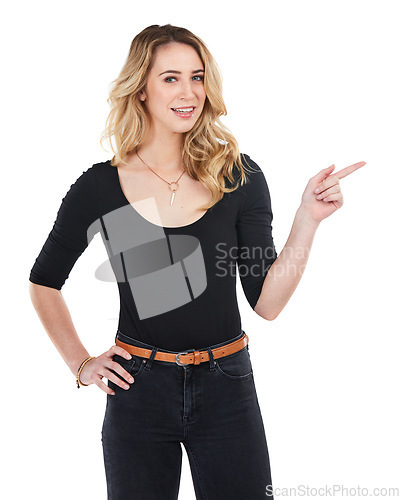 Image of Direction, marketing and portrait of a woman pointing isolated on a white background in studio. Product placement, recommendation and girl advertising a brand or product on a studio background