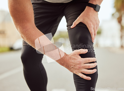 Image of Runner legs, fitness injury and outdoor exercise for cardio training, sports workout run and knee pain. Athlete hands, muscle accident and leg orthopedic arthritis or running emergency in city street
