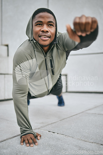 Image of Strength training, stretching and black man with fitness vision, body balance and health goal in the city of Canada. Commitment, plank and African athlete on stairs for urban workout and cardio