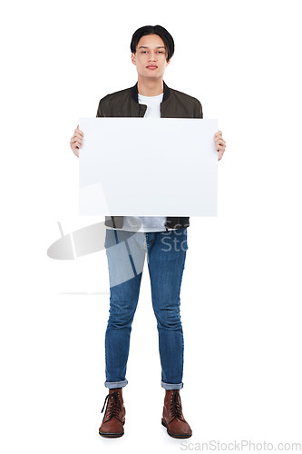 Image of Sign, portrait and man with poster for mockup, marketing or advertising space in studio isolated on a white background. Product placement, branding and young male with banner for mock up or promotion