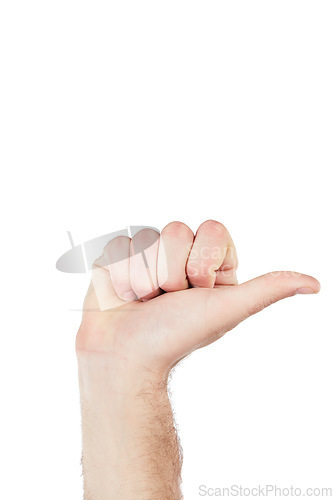 Image of Hand, communication and man thumb pointing in a studio for sign language, direction or counting. Finger, body language and man with a hand gesture isolated by a white background with mockup space.