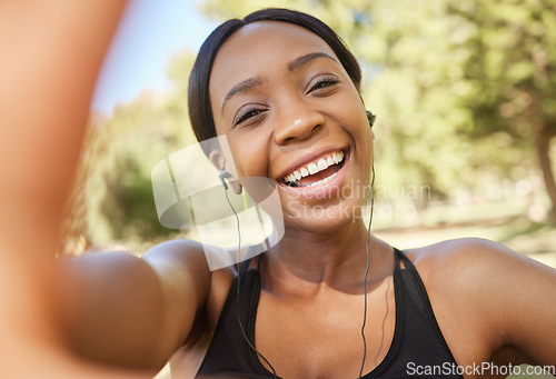 Image of Fitness, selfie and black woman in park for workout, exercise and healthy lifestyle with music. Portrait, smile and female athlete taking photograph for social media, sports wellness and video call