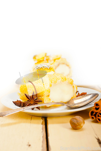 Image of cream roll cake dessert and spices