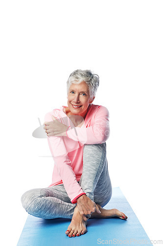 Image of Senior woman, yoga and portrait in studio isolated on a white background. Zen chakra, pilates fitness and retired female from Canada sitting on training or stretching break for health or wellness.