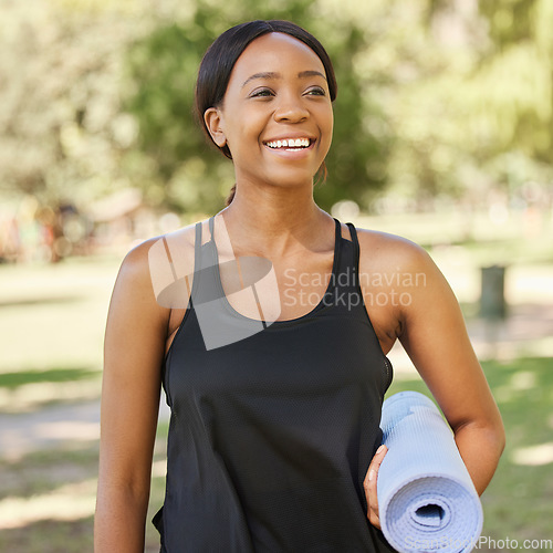 Image of Yoga, exercise mat and mindfulness with a black woman in a park, outdoor for fitness, health or wellness. Mental health, pilates and workout with a female athlete training outside for balance