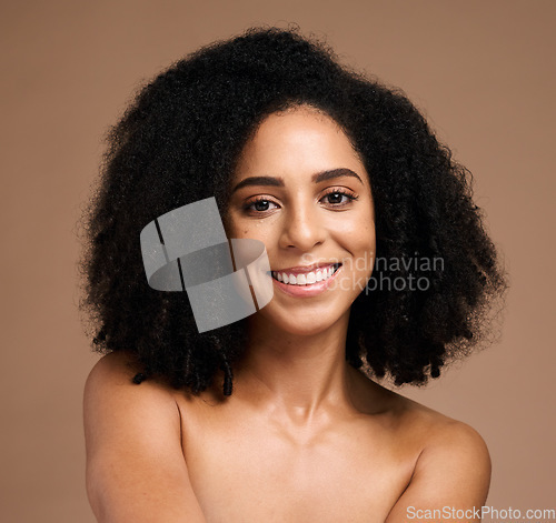 Image of Face, beauty and black woman in portrait, smile with skincare, glow and natural cosmetics, hair care and microblading. Teeth, clean with facial, healthy skin and wellness against studio background