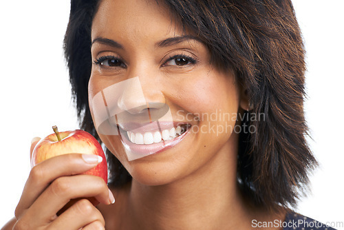 Image of Portrait, health or black woman eating an apple in studio on white background with marketing mockup space. Happy, face or African girl advertising a healthy diet of fruit or nutrition for wellness