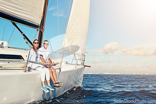 Image of Vacation, ocean and portrait of a couple on a yacht for adventure, freedom and sailing trip. Travel, summer and mature man and woman on a boat in the sea for a romantic seaside holiday in Greece.