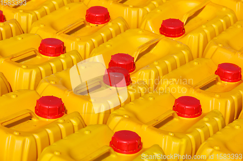 Image of Yellow plastic canister for water or gasoline