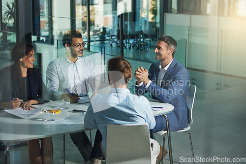 Image of Business people, meeting and discussion for corporate planning, strategy or brainstorming at the office. Group of employee workers in business meeting, team planning or collaboration at the workplace