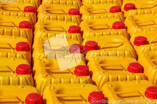 Image of Yellow plastic canister for water or gasoline