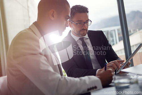 Image of Business people, meeting and tablet for planning online, corporate strategy or partnership. Corporate men together in a discussion about finance and budget for online marketing ideas in office