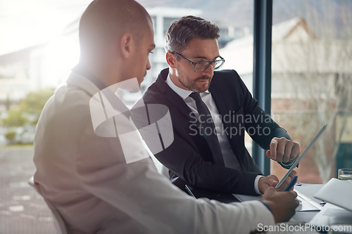 Image of Business people, tablet and planning online for corporate strategy during discussion of information. Man in a meeting with manager, mentor or coach for finance investment conversation on mobile app