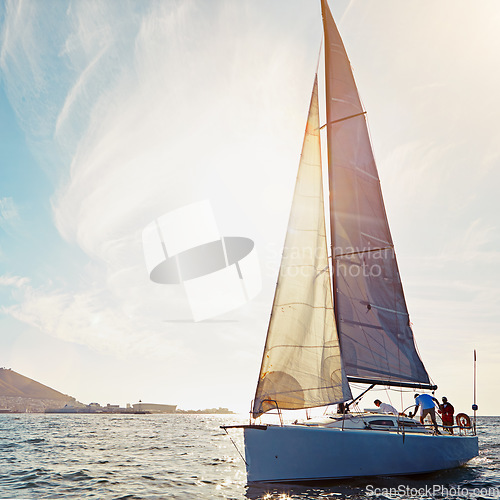 Image of Ocean, yacht travel and sailing on the sea on vacation by summer sunshine on water. Lens flare, luxury holiday adventure and boat cruise of people in the sun and blue sky in nature with mockup