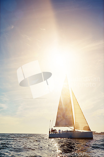 Image of Mockup, friends and a yacht at sea for travel, tourism or a luxury summer vacation outdoor. Sunset, water and wave with a boat on the ocean in nature for an adventure, holiday or getaway with flare