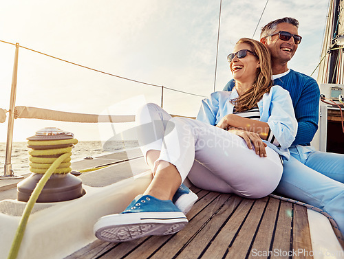 Image of Smile, happy and couple on a yacht at sea, summer travel and ocean adventure in Spain. Peace, hug and man and woman on a boat for a luxury cruise, sailing and happiness on holiday on the water