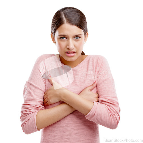 Image of Portrait, breast cancer and holding chest with an indian woman in studio isolated on a white background. Health, medical and cancer with a sad young female on blank space to promote awareness