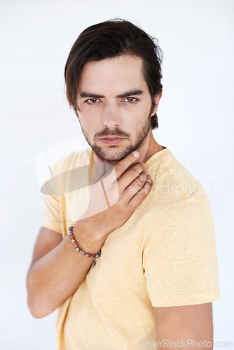 Image of Idea, studio portrait and man thinking, focus and contemplating problem solving plan. Question, pensive doubt and puzzled model think of solution, decision or choice isolated on white background wall