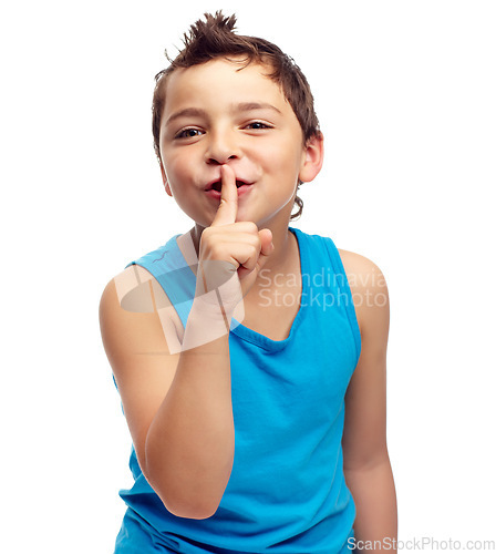 Image of Portrait, secret and children with a boy standing finger on lips in studio isolated on a white background. Kids, whisper and gossip with a male child on blank space in secrecy or siilence