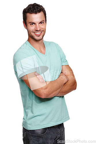 Image of Man, portrait and happy model with a smile and arms crossed with isolated white background. Calm, happiness and vertical casual positive person with tshirt in a studio with mock up standing alone